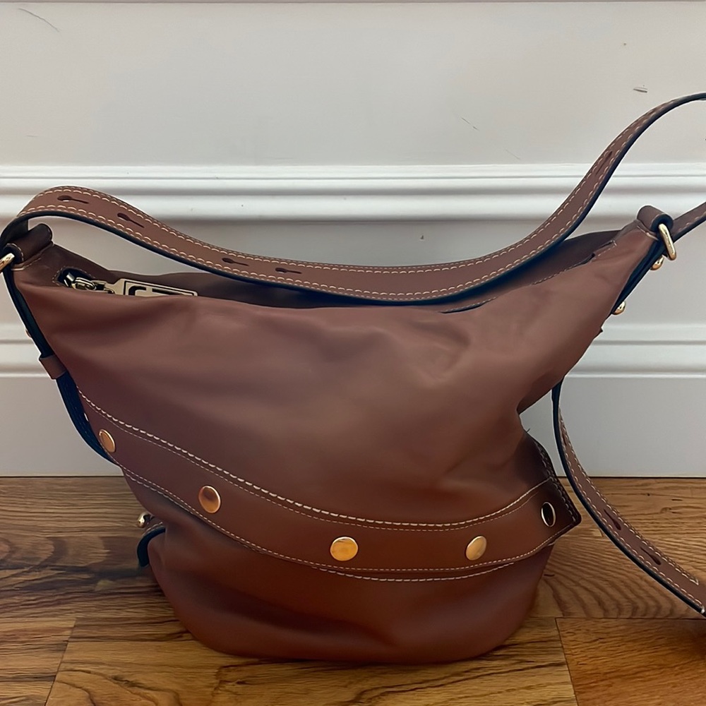 Marc jacobs cognac leather sling bag.